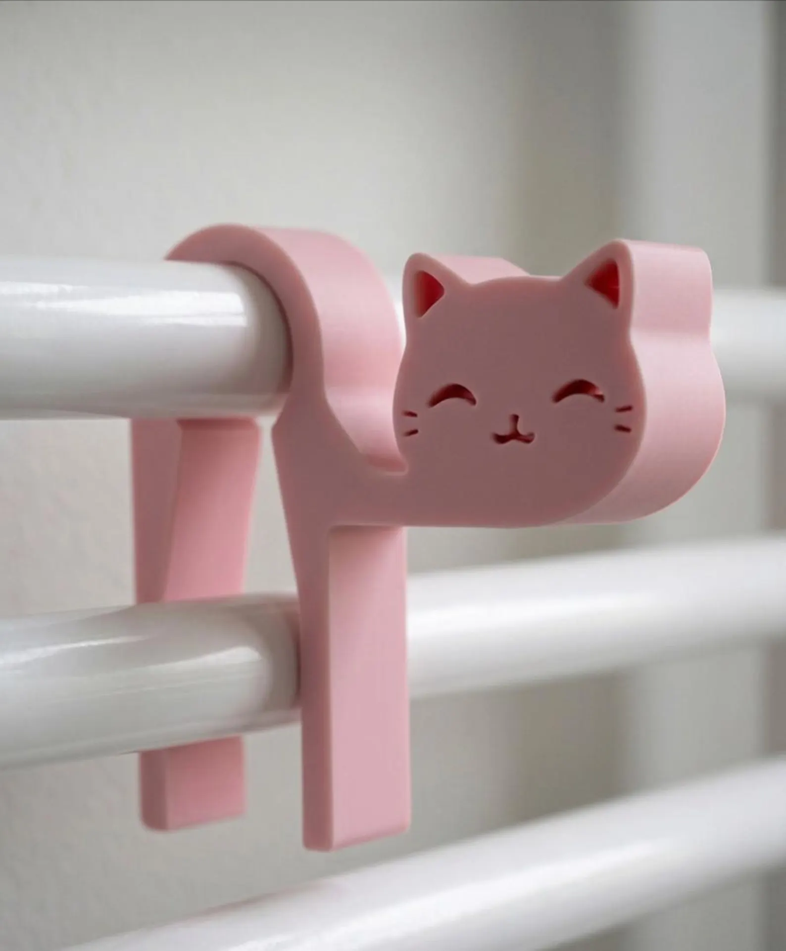 Porte-serviette chat pour radiateur